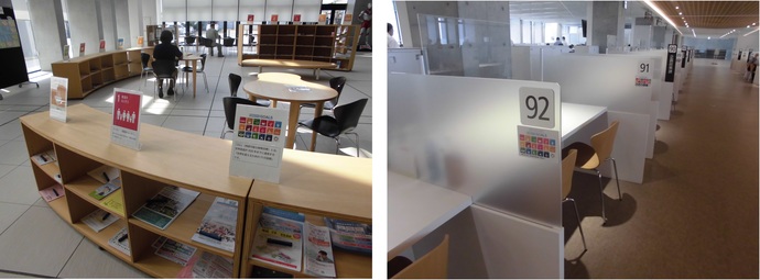（左）開放的な共有スペースにSDGsのパネルが置かれた木製の棚や丸テーブルが並んでいる写真、（右）番号とSDGsのステッカーが貼られた半透明の仕切り板がついた窓口が並んでいる写真